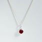 Silver ruby charm pendant