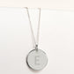 Stirling silver disc pendant necklace engraved with letter E