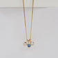 White topaz, sapphire and aquamarine birthstone charms on a chain