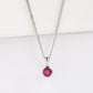 White Gold Ruby Charm on a chain